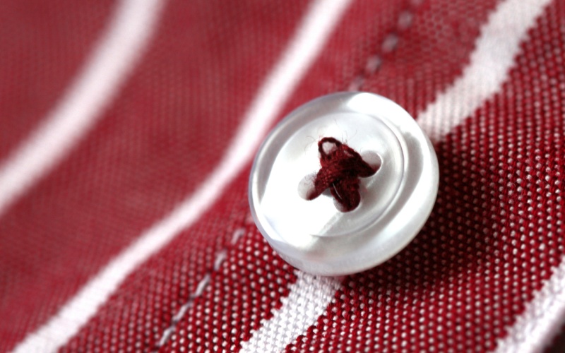 Astuce Renforcer les boutons des vêtements